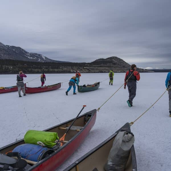 Canadian Outdoor Academy walking canoes on ice